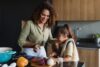 Hispanic,Mother,And,Child,Daughter,Cooking,At,Kitchen,In,Mexico